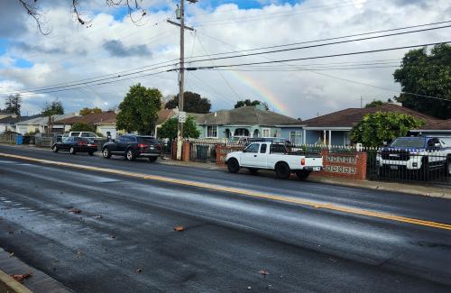 Rainbow over homes on Pulgas Avenue