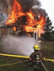 Putting out a house fire