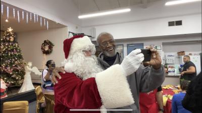 Santa Clause and Dempsey take a selfie